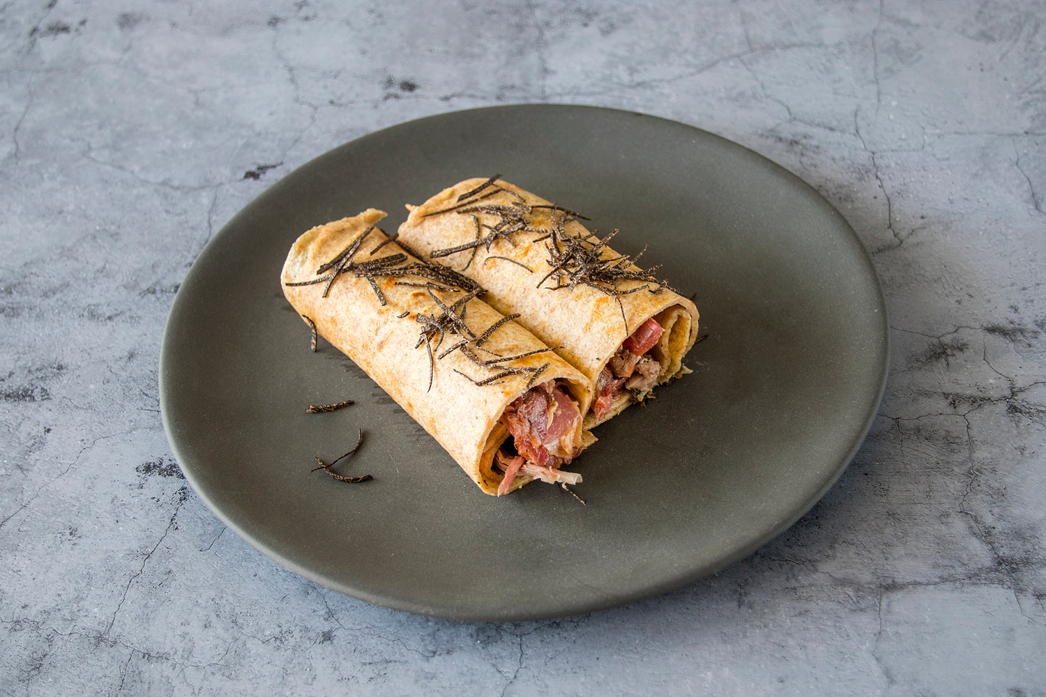 Crepe with duck confit and black truffle